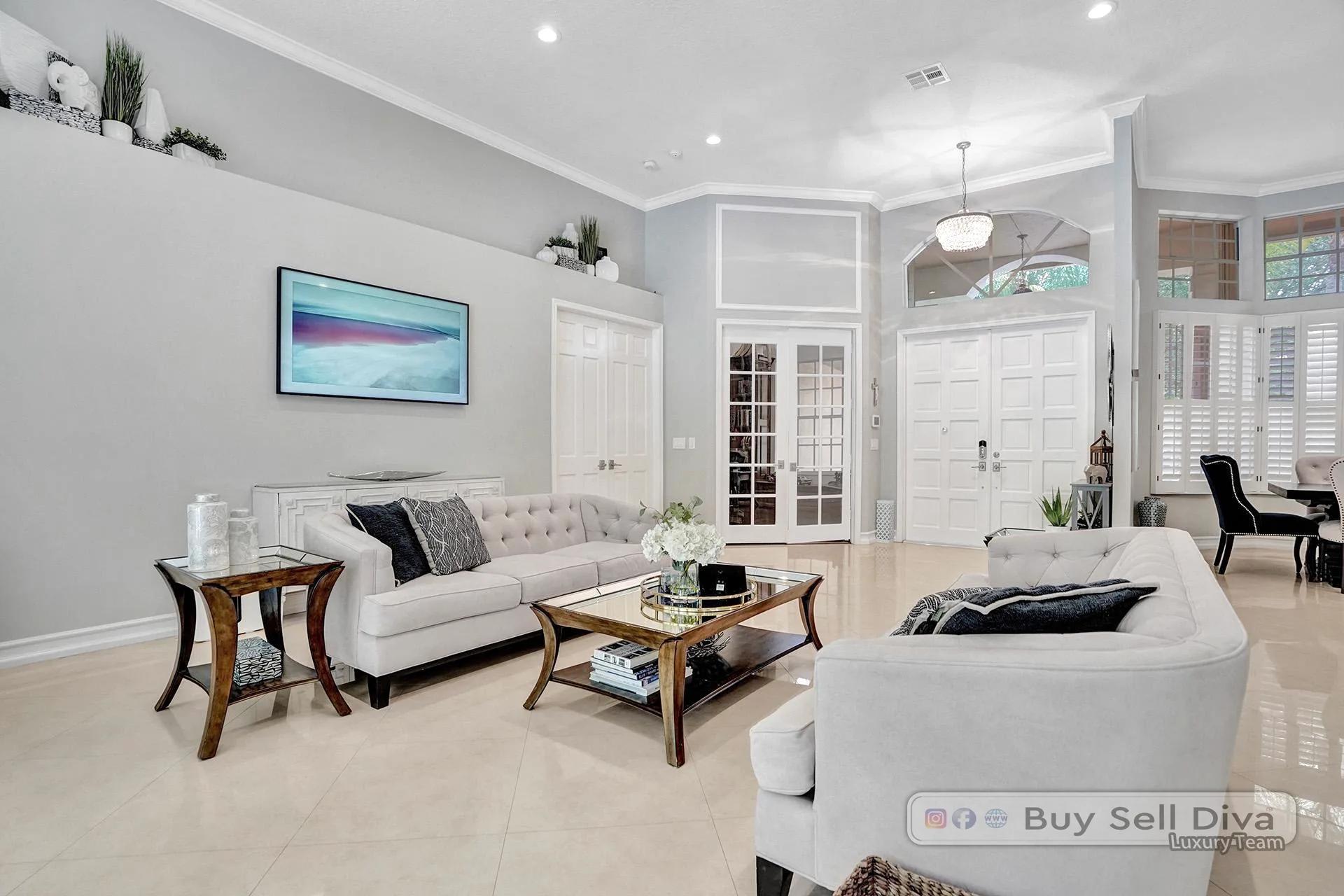Light-filled living room with high ceilings in a Weston Florida home.