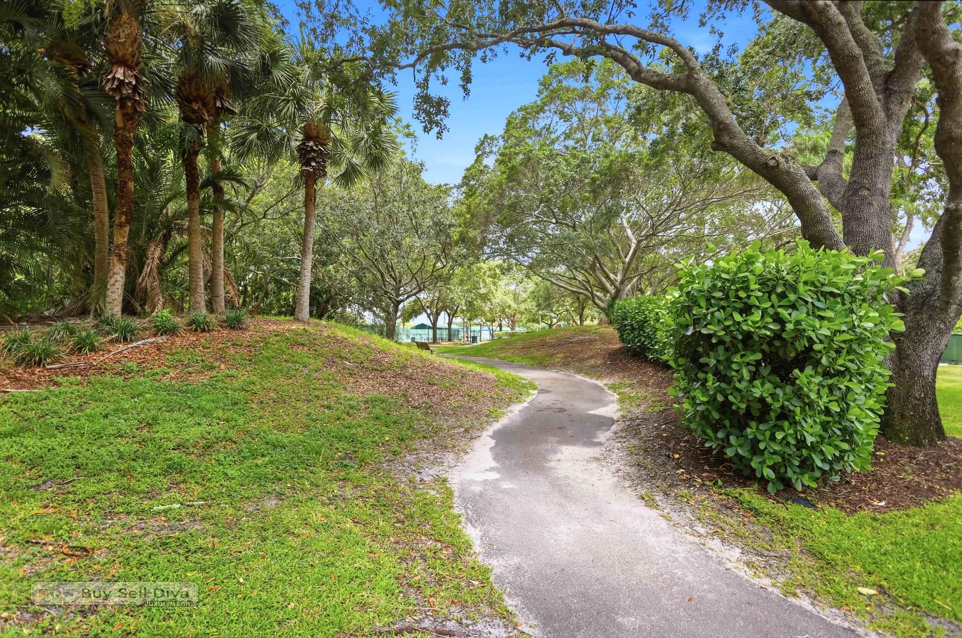 Tree-lined walking path connecting the neighborhood to Terramar Park