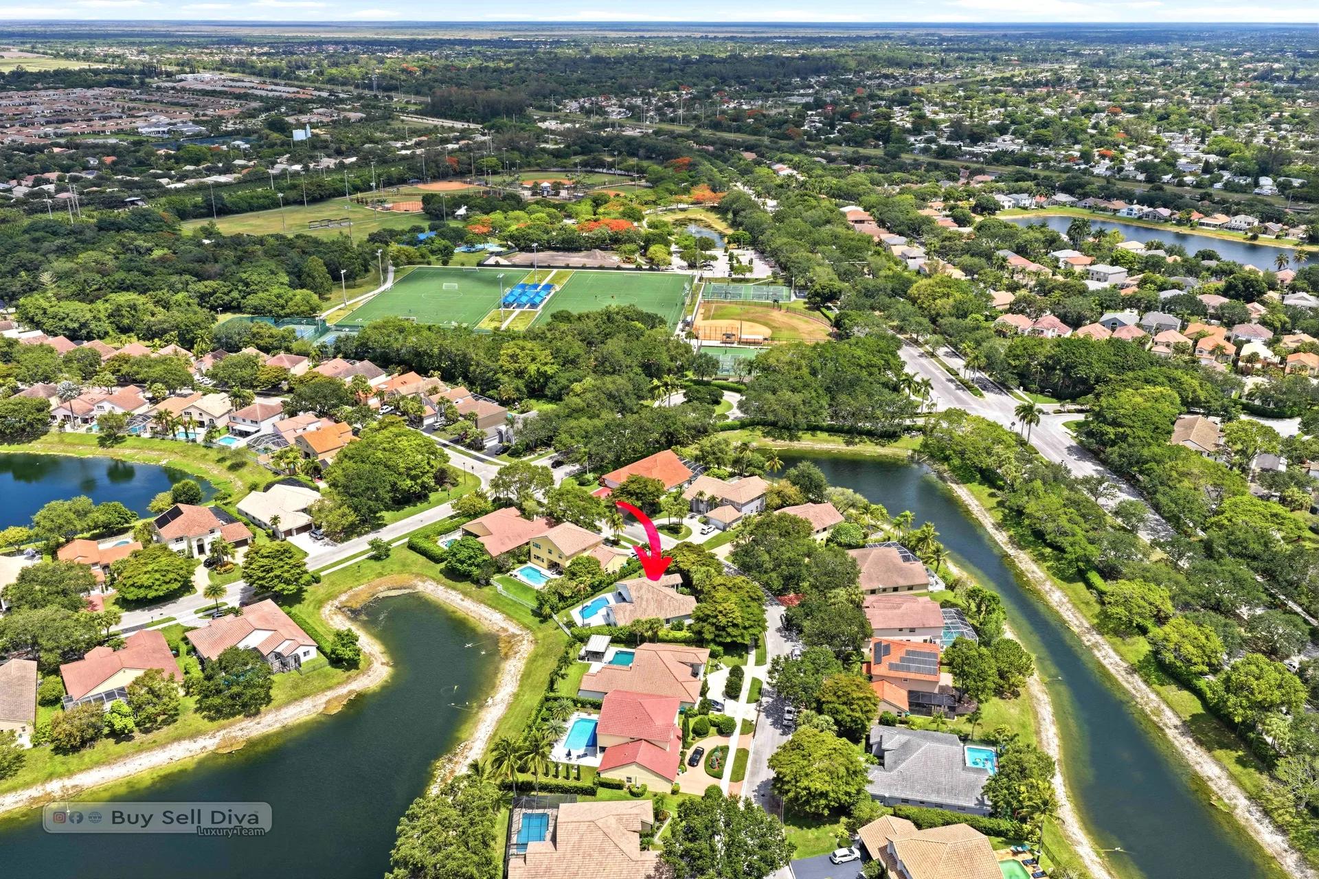 Aerial view marking the home beside Terramar Park ball fields and courts