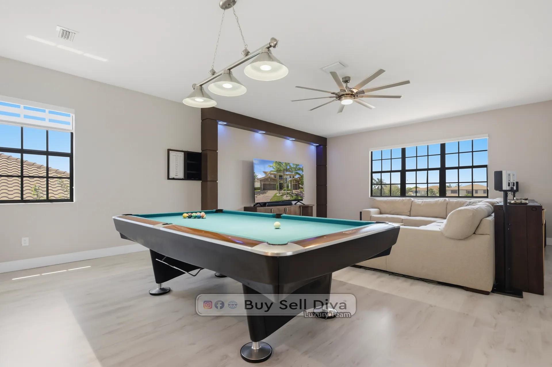 Relocate to Parkland Florida: second-floor game room with pool table in modern estate home