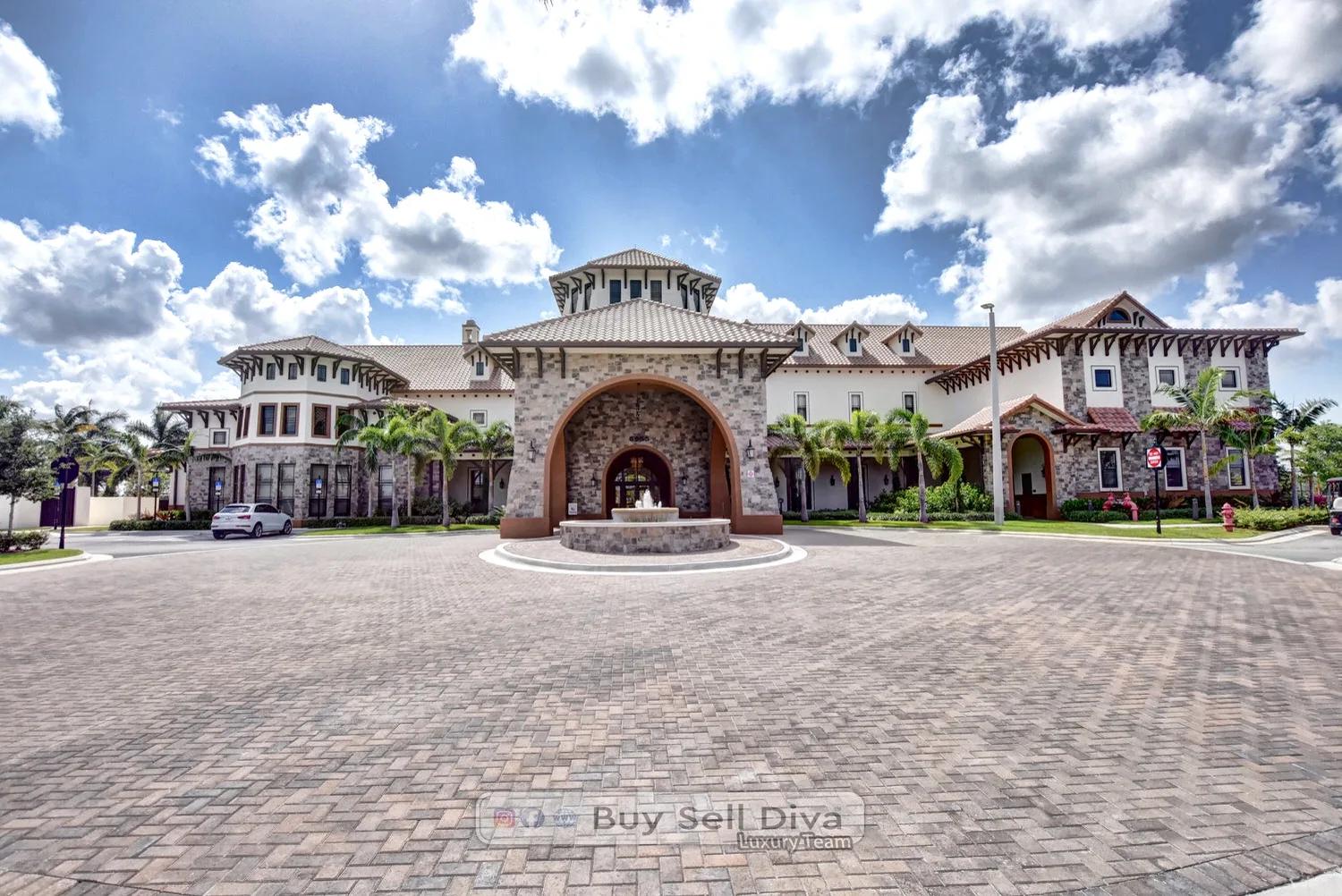 Stone archway and fountain at the front entrance of the MiraLago clubhouse in Parkland Florida